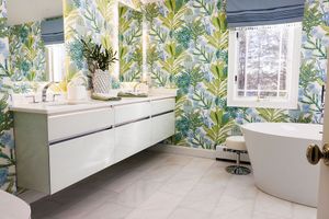 Luxury bathroom renovation with double vanity and walk-in shower