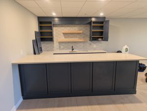 Signature kitchen remodel with custom cabinetry and island